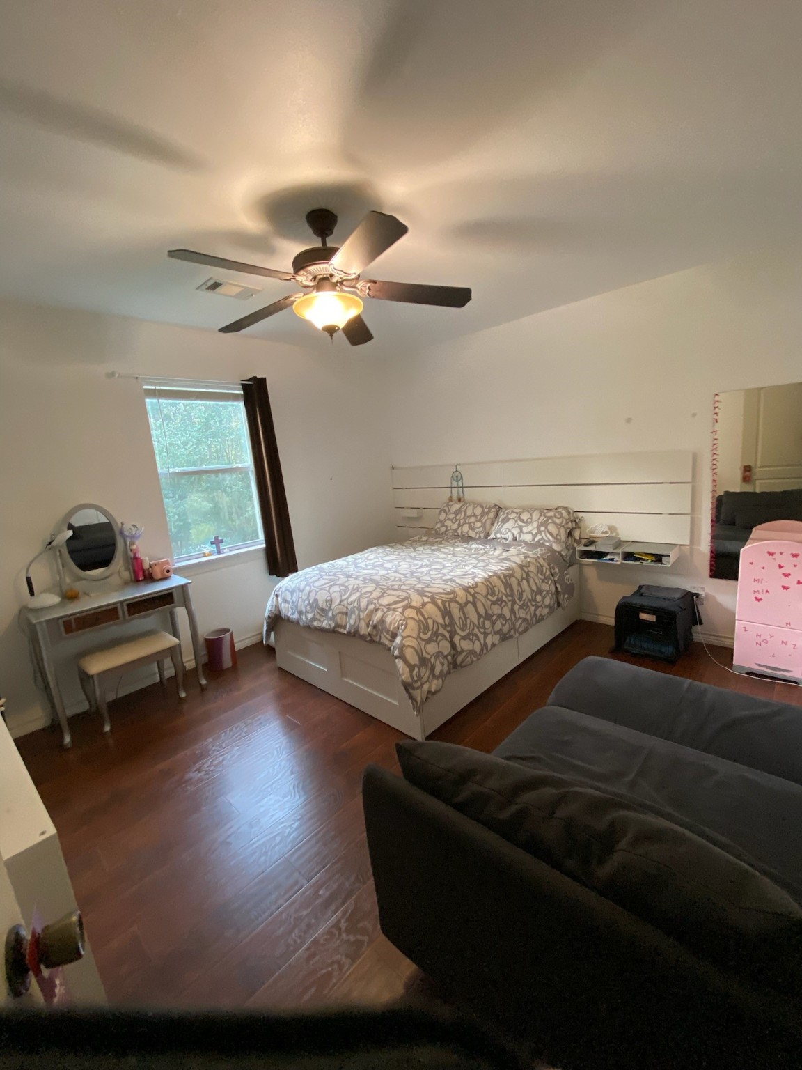 195 Rim Rock Road Onalaska, TX 77360 - Photo 15 of 45 a bedroom with a bed gym equipment and view of living room