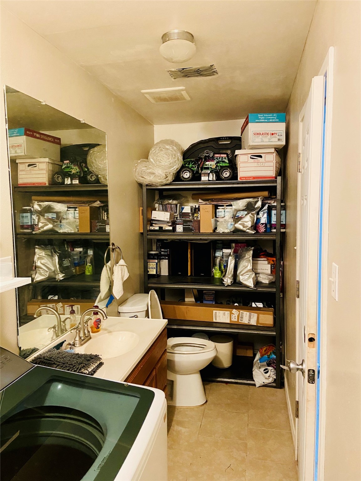 195 Rim Rock Road Onalaska, TX 77360 - Photo 29 of 45 a room with storage and utility