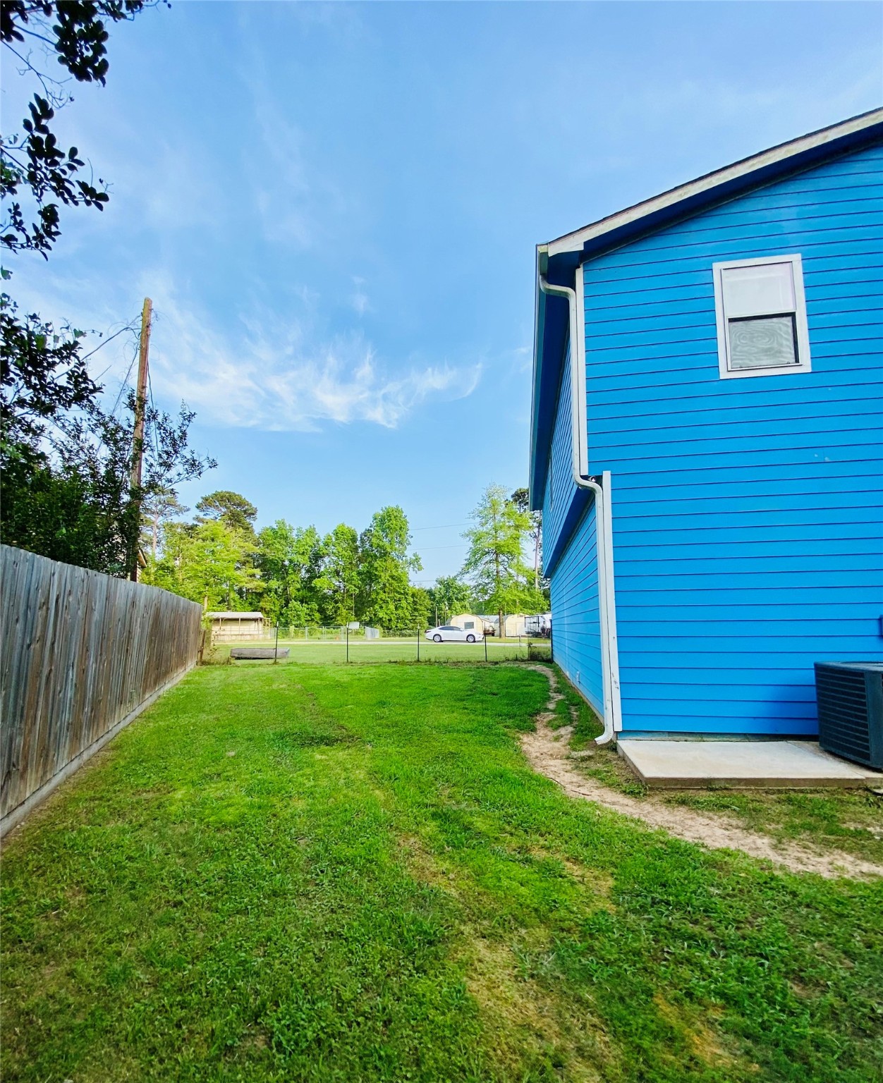 195 Rim Rock Road Onalaska, TX 77360 - Photo 43 of 45 a view of a backyard