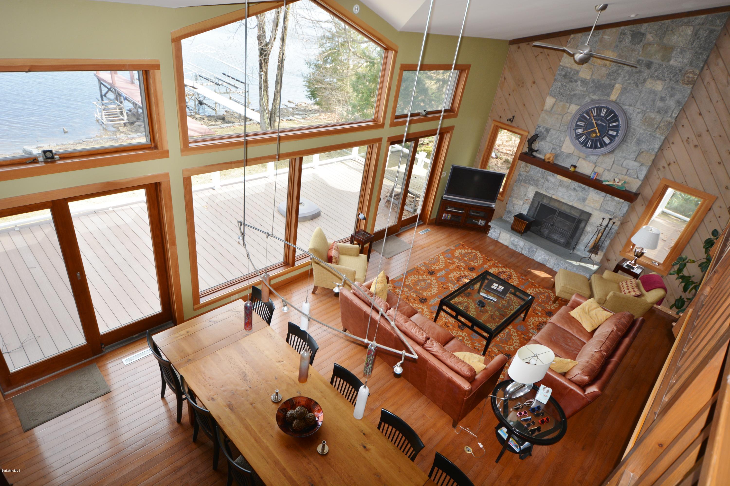 408 Pine Road Otis, MA 01029 - Photo 8 of 35 a living room with furniture and a fireplace