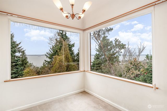 a view of a hallway with a window