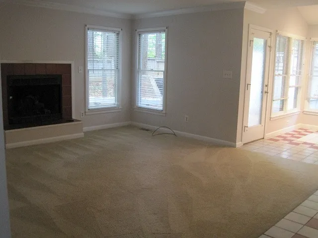 an empty room with windows