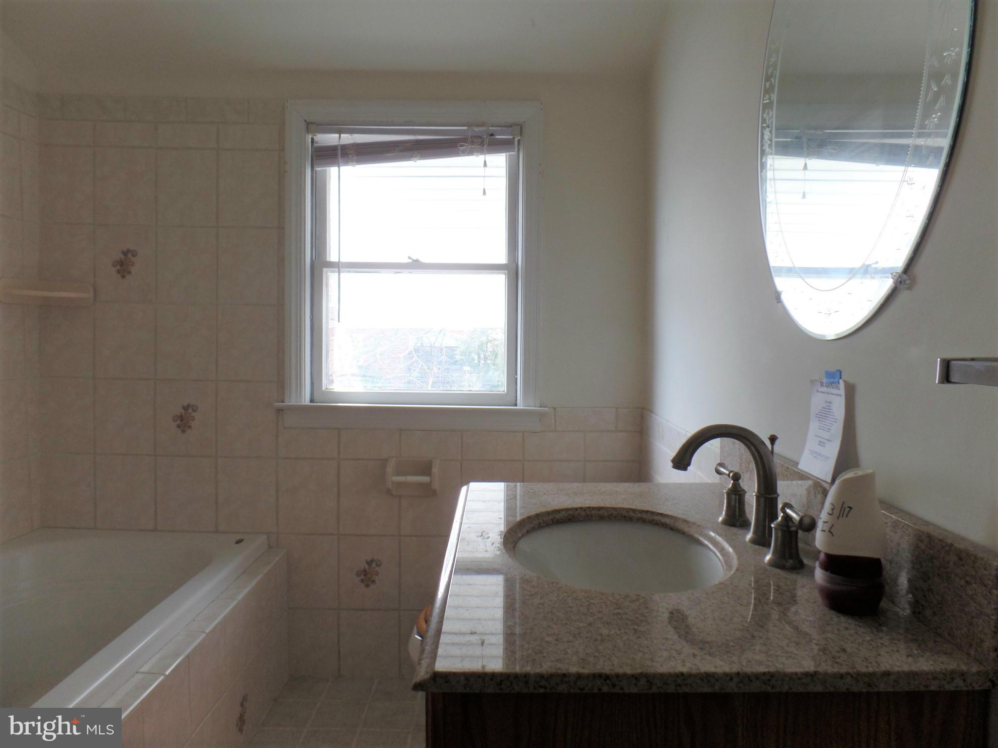 6407 Kenwood Avenue Rosedale, MD 21237 - Photo 6 of 17 Upstairs Hall Bathroom