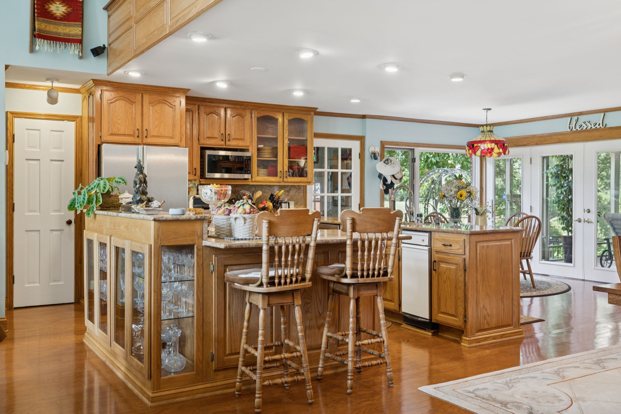 3225 Pinson School Road Greenbrier, TN 37073 - Photo 15 of 96 a living room with furniture a flat screen tv and floor to ceiling windows