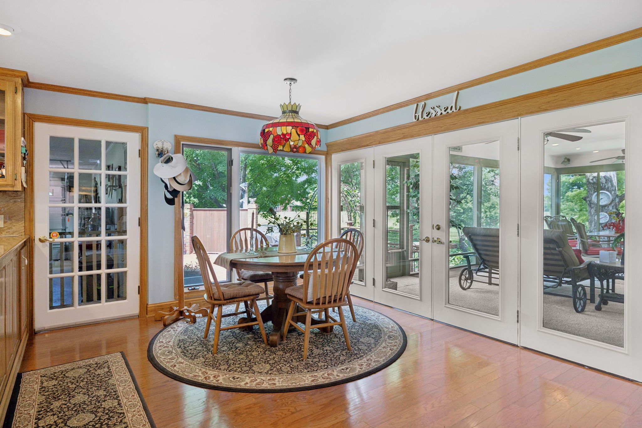 3225 Pinson School Road Greenbrier, TN 37073 - Photo 19 of 96 a view of a dining room with furniture wooden floor and a potted plant