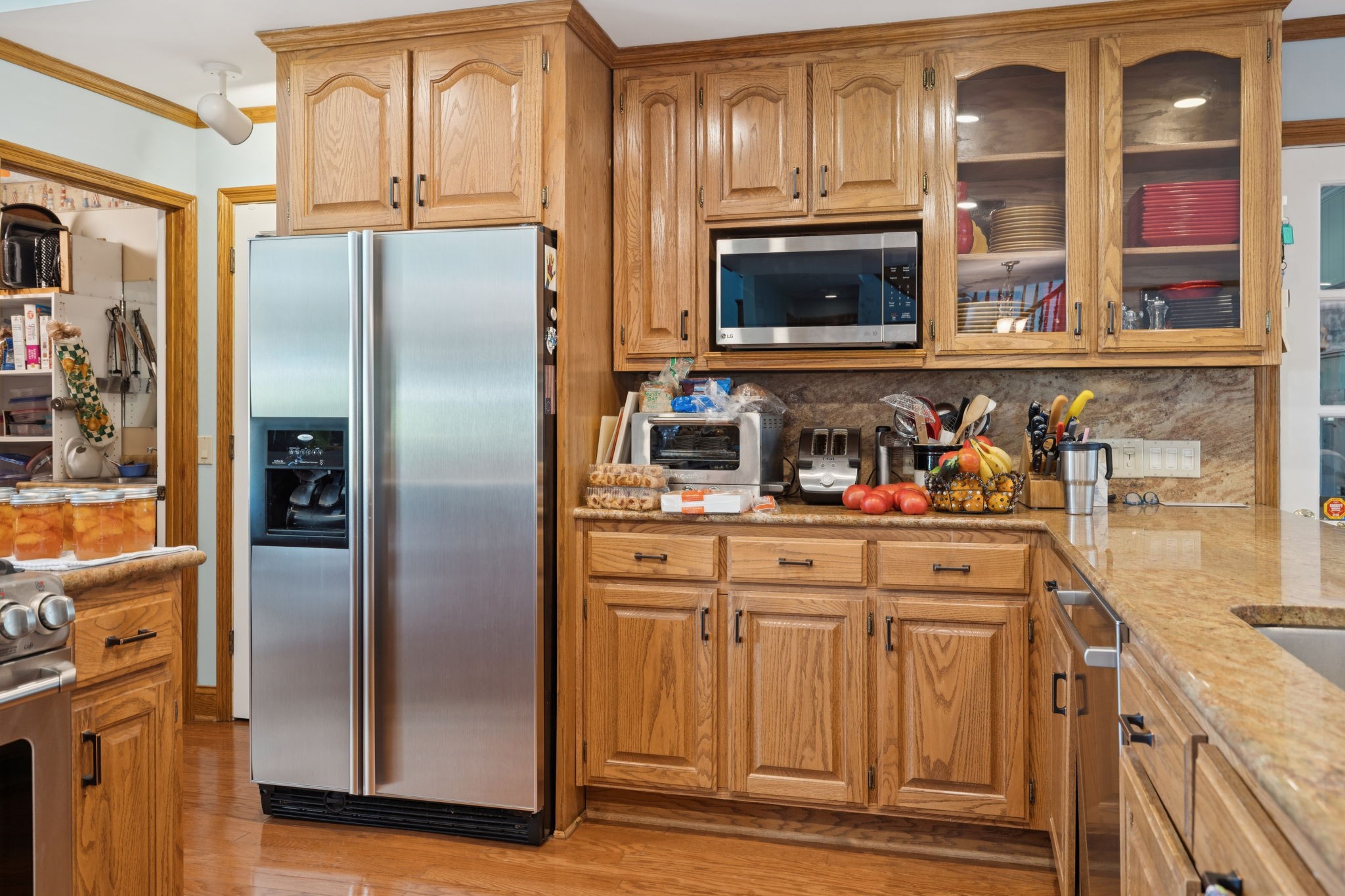 3225 Pinson School Road Greenbrier, TN 37073 - Photo 20 of 96 a kitchen with stainless steel appliances granite countertop a refrigerator and a stove