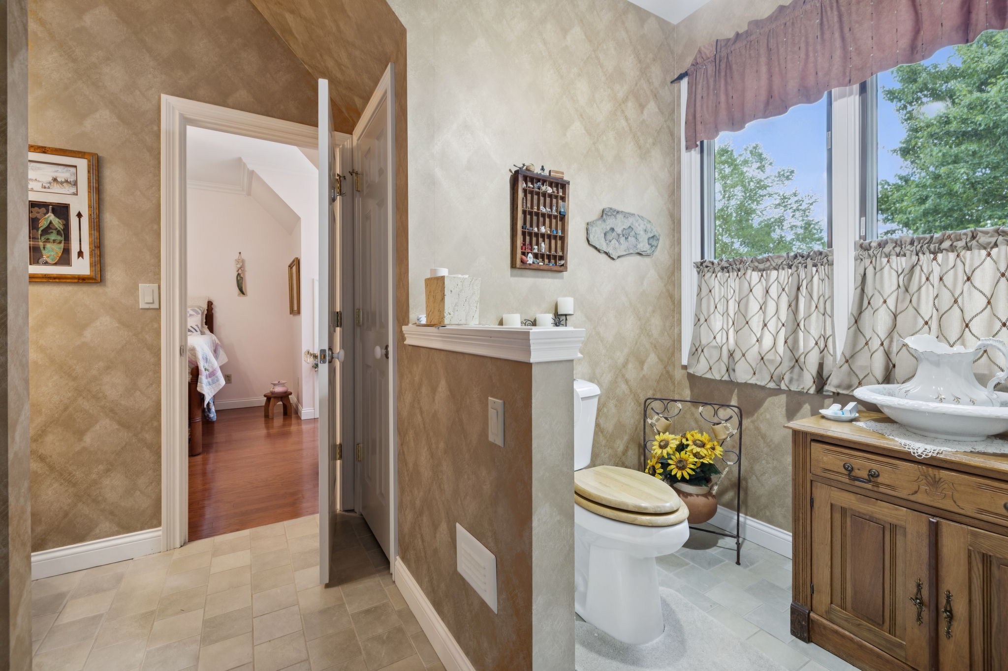 3225 Pinson School Road Greenbrier, TN 37073 - Photo 41 of 96 a bathroom with a granite countertop sink a toilet and a shower