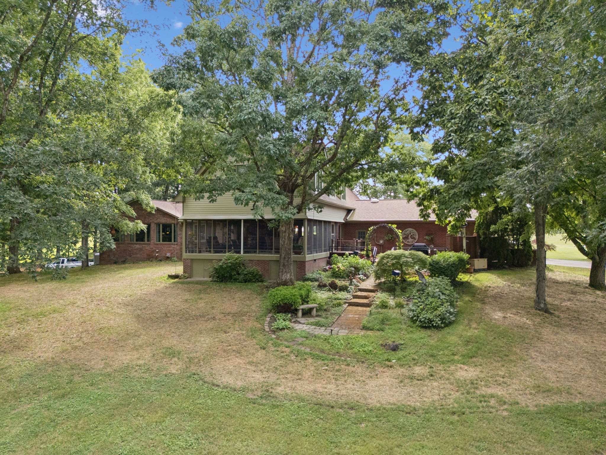 3225 Pinson School Road Greenbrier, TN 37073 - Photo 50 of 96 a backyard of a house with table and chairs