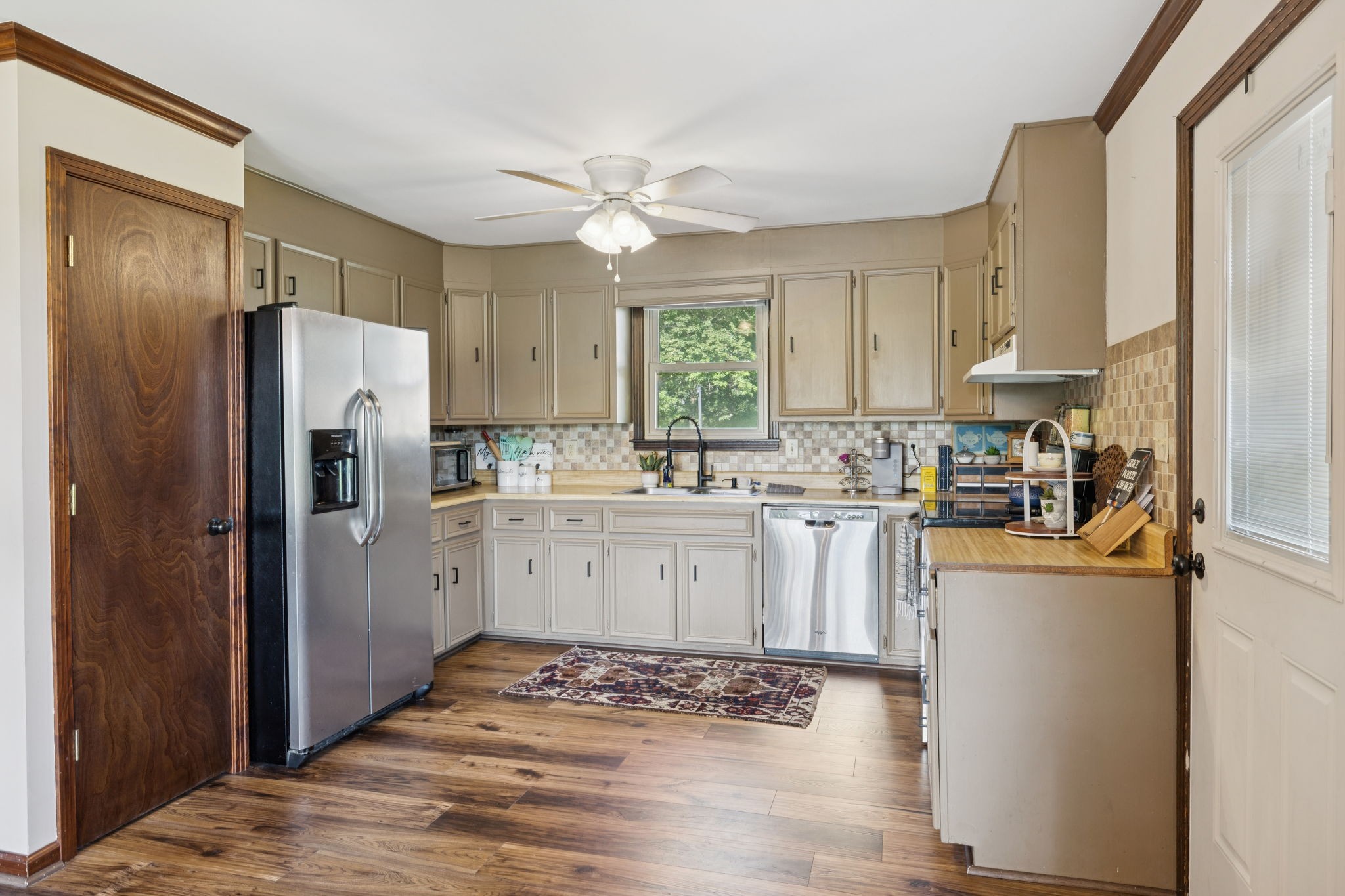 3225 Pinson School Road Greenbrier, TN 37073 - Photo 61 of 96 a kitchen with a refrigerator sink and cabinets