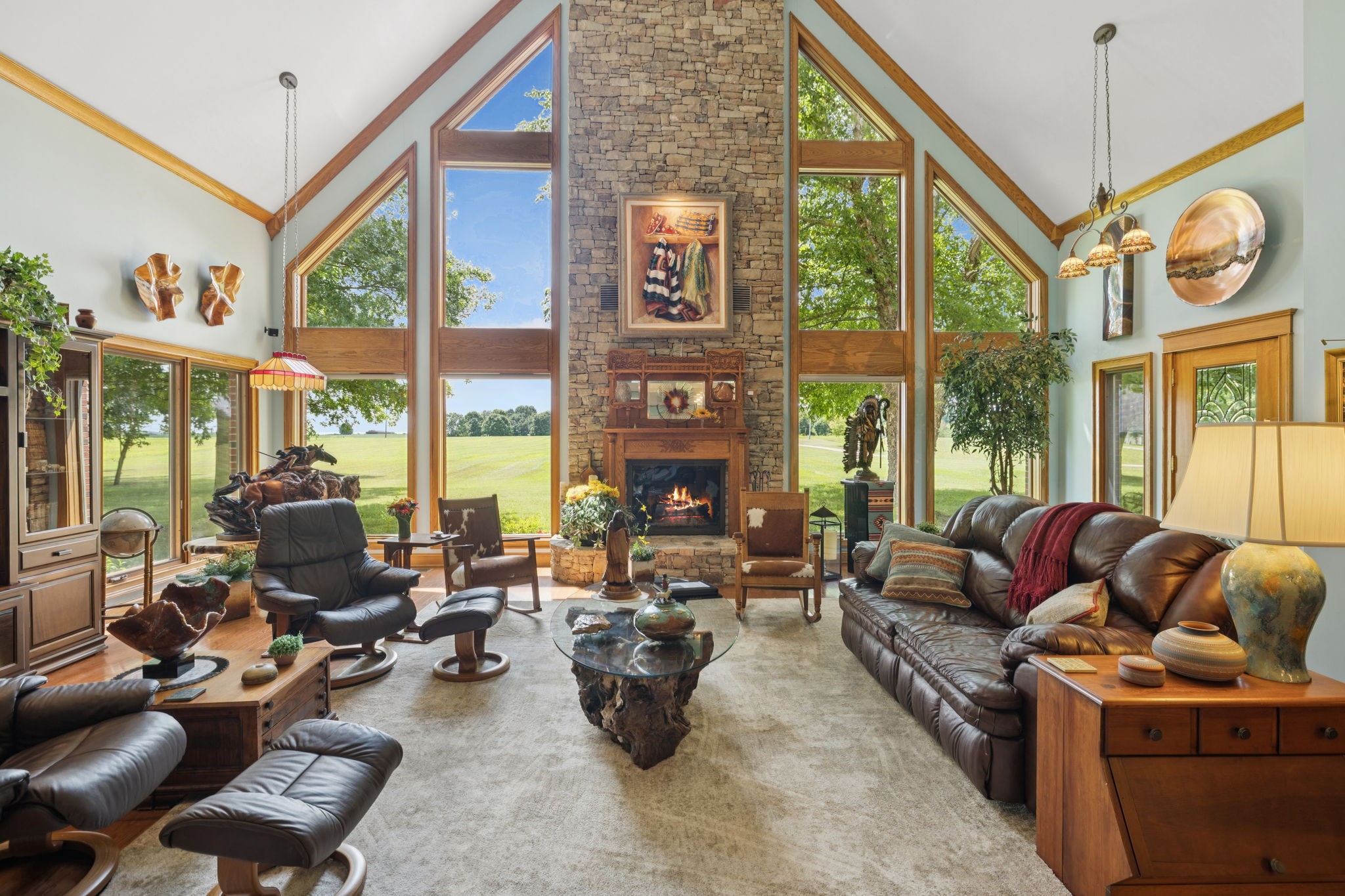 3225 Pinson School Road Greenbrier, TN 37073 - Photo 10 of 96 a living room with furniture a large window and a chandelier
