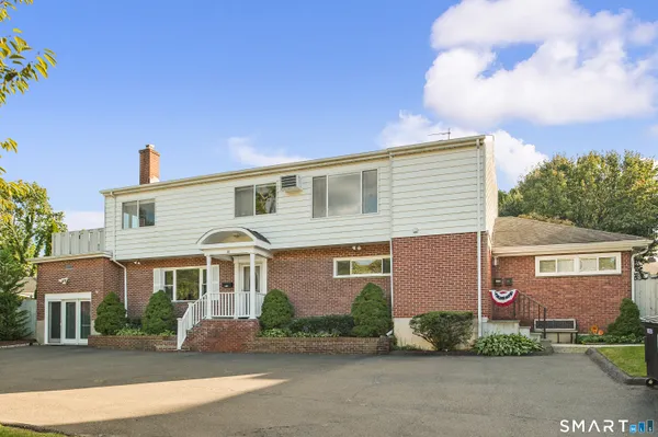 front view of a house with a street