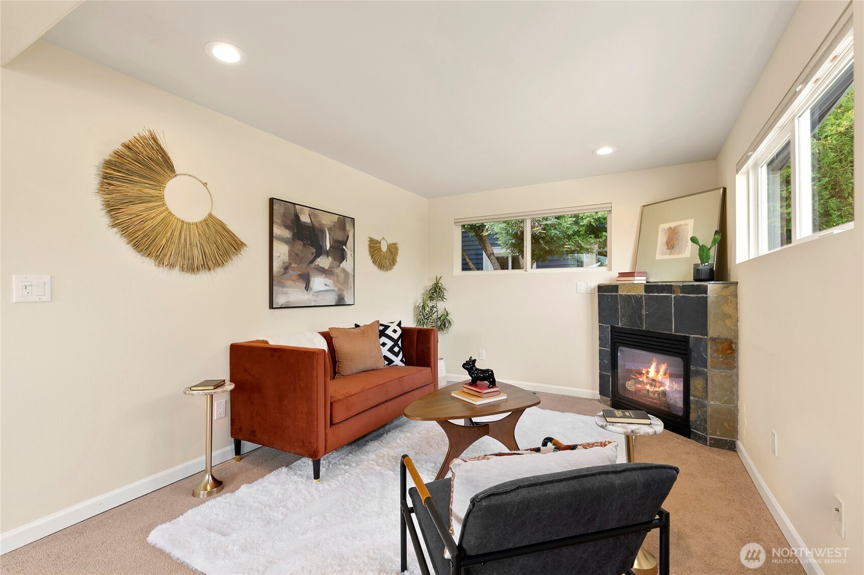 3701 Southwest Southern Street Seattle, WA 98126 - Photo 14 of 33 a living room with furniture and a fireplace