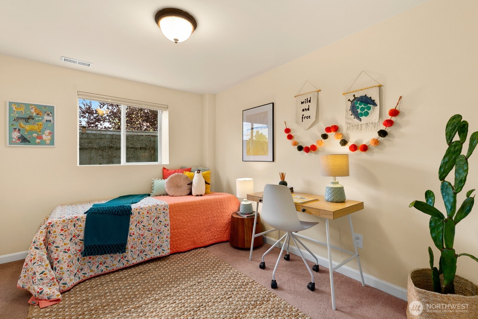 3701 Southwest Southern Street Seattle, WA 98126 - Photo 21 of 33 a bedroom with a bed and a window
