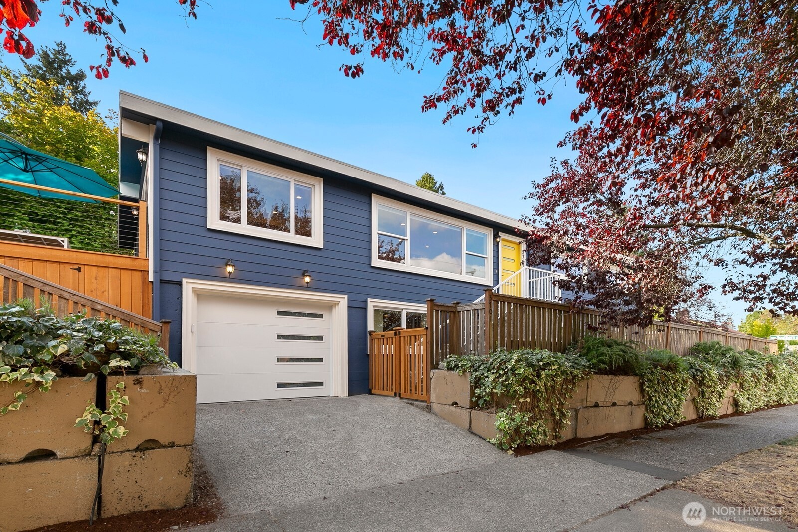 3701 Southwest Southern Street Seattle, WA 98126 - Photo 3 of 33 a front view of a house with a garage