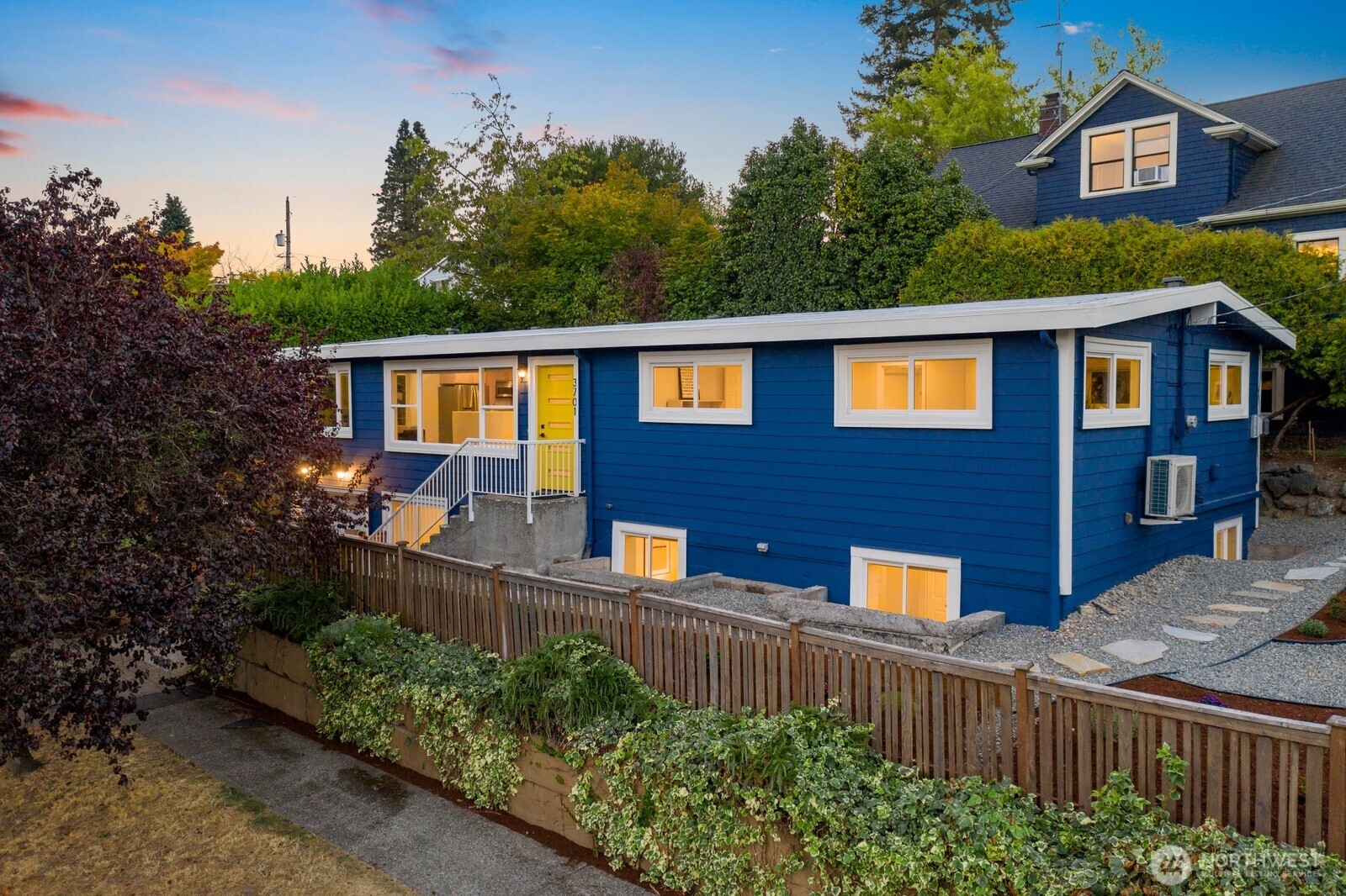 3701 Southwest Southern Street Seattle, WA 98126 - Photo 31 of 33 a front view of a house with a yard