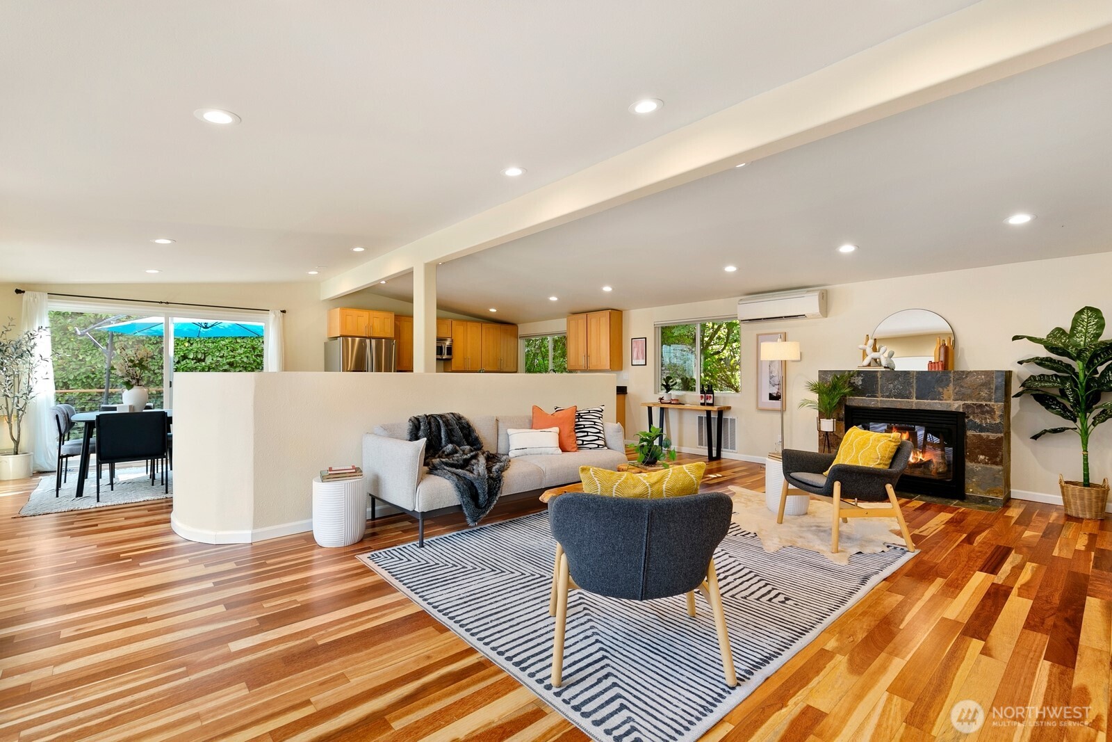 3701 Southwest Southern Street Seattle, WA 98126 - Photo 5 of 33 a living room with furniture a table and kitchen view