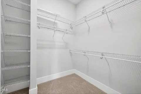 a view of a room with racks on the wall