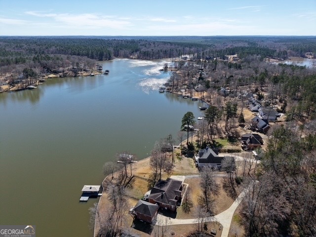 124 Myrick Road Northwest Milledgeville, GA 31061 - Photo 12 of 41 an aerial view of a house with a lake view