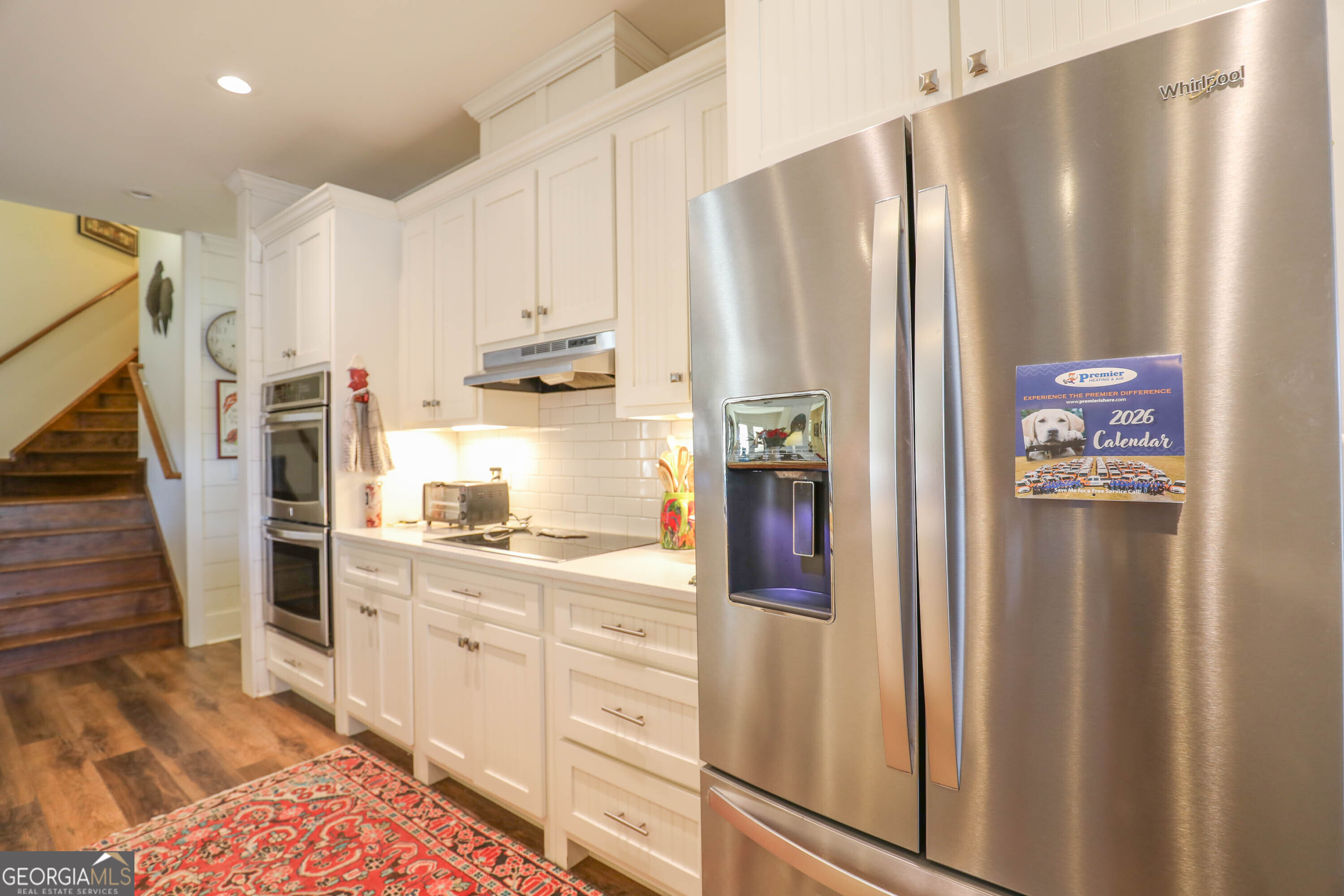 124 Myrick Road Northwest Milledgeville, GA 31061 - Photo 16 of 41 a kitchen with stainless steel appliances a refrigerator and cabinets