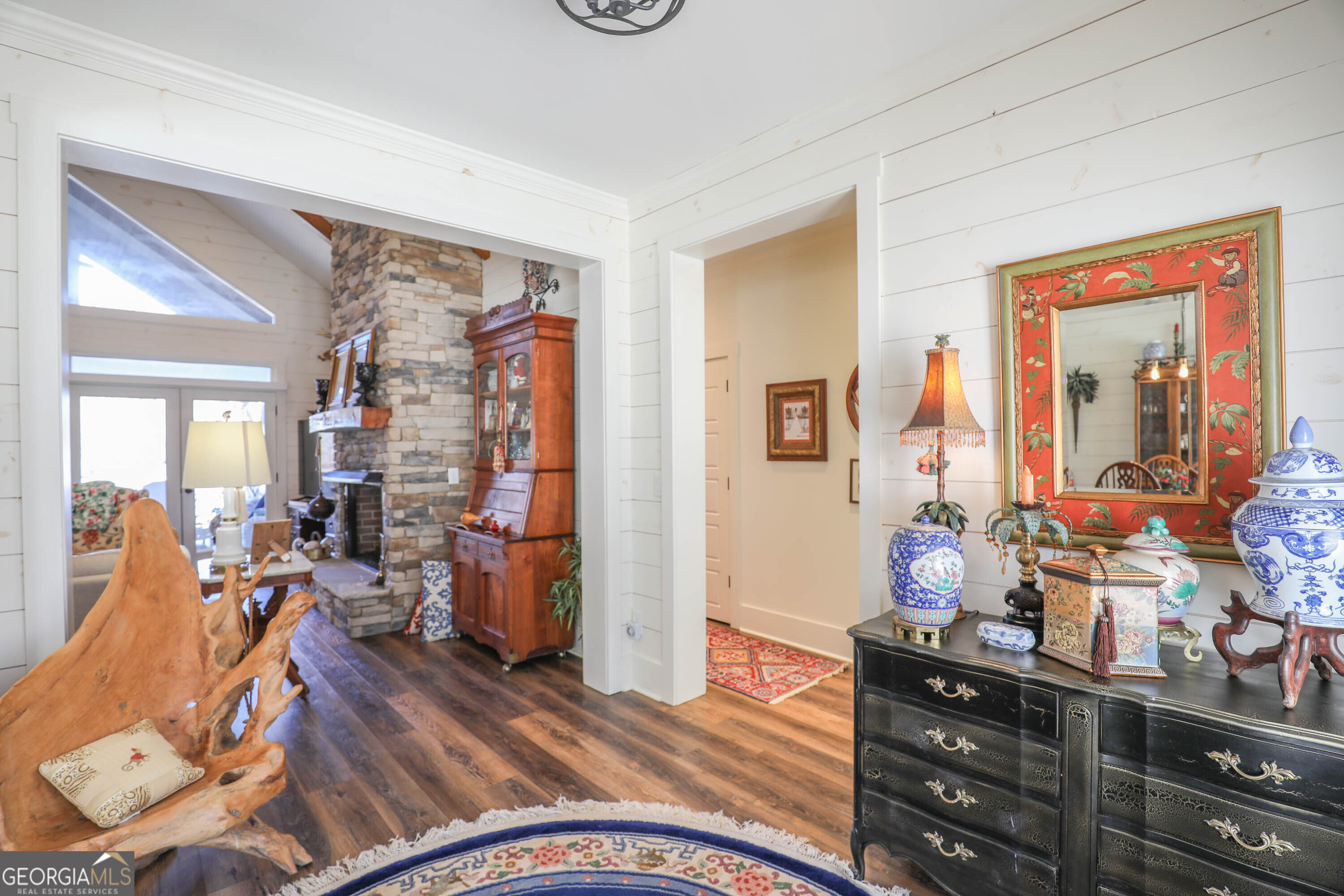 124 Myrick Road Northwest Milledgeville, GA 31061 - Photo 21 of 41 a living room with furniture and wooden floor