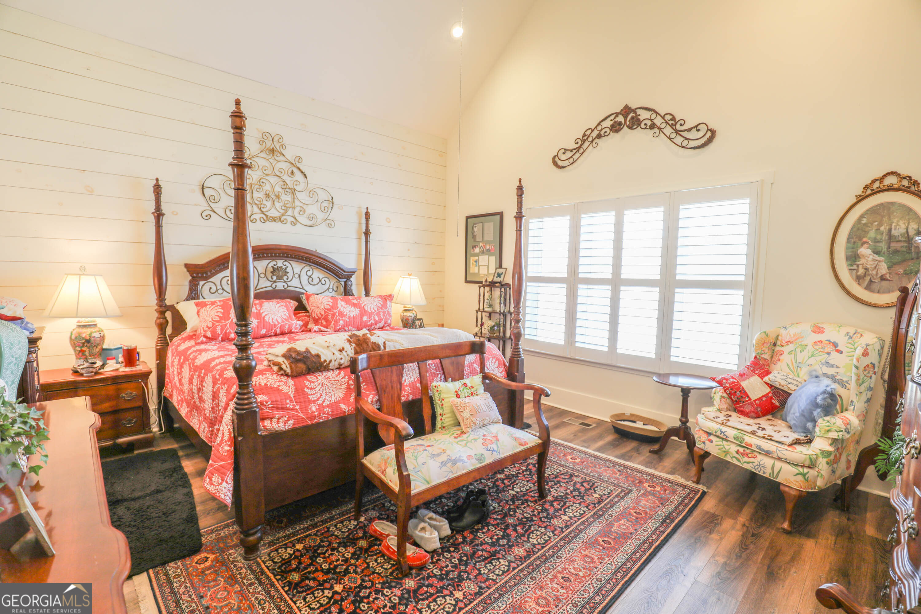 124 Myrick Road Northwest Milledgeville, GA 31061 - Photo 30 of 41 a living room with furniture a rug and a chandelier
