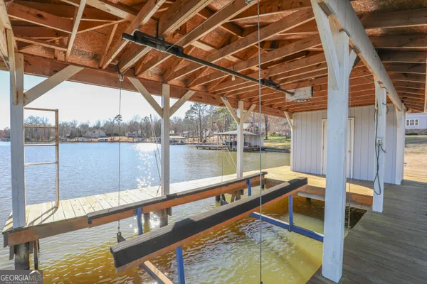 a view of a balcony with wooden floor