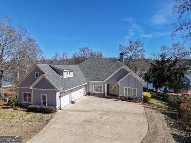 124 Myrick Road Northwest Milledgeville, GA 31061 - Photo 4 of 41 a front view of a house with a yard