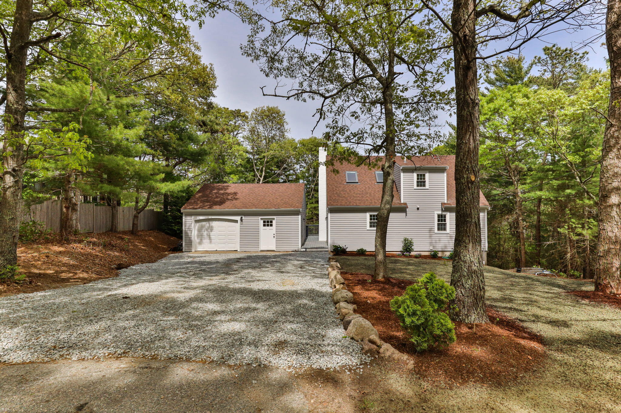 81 Sam Turner Road East Falmouth, MA 02536 - Photo 4 of 37 front view of a house with a tree