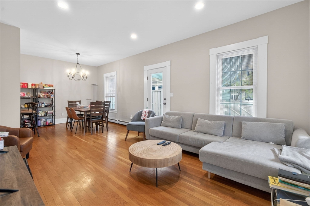 50 Roberts Road Cambridge, MA 02138 - Photo 3 of 25 a living room with furniture and wooden floor