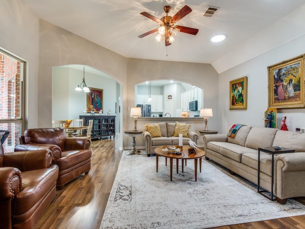 9962 Bell Rock Road Frisco, TX 75035 - Photo 10 of 28 a living room with furniture and a large window