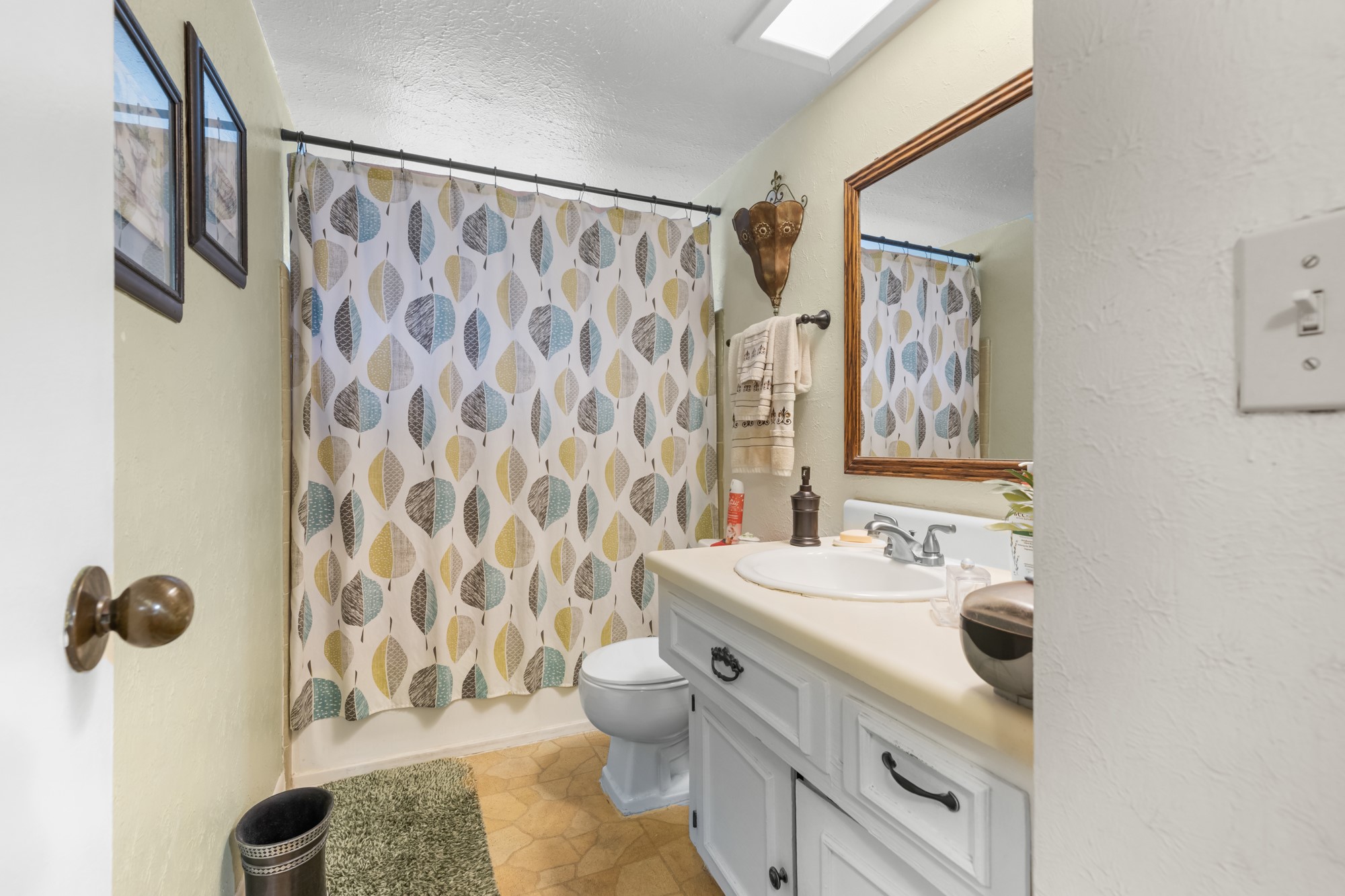 3622 Beau Lane Houston, TX 77039 - Photo 9 of 13 a bathroom with a sink toilet and shower