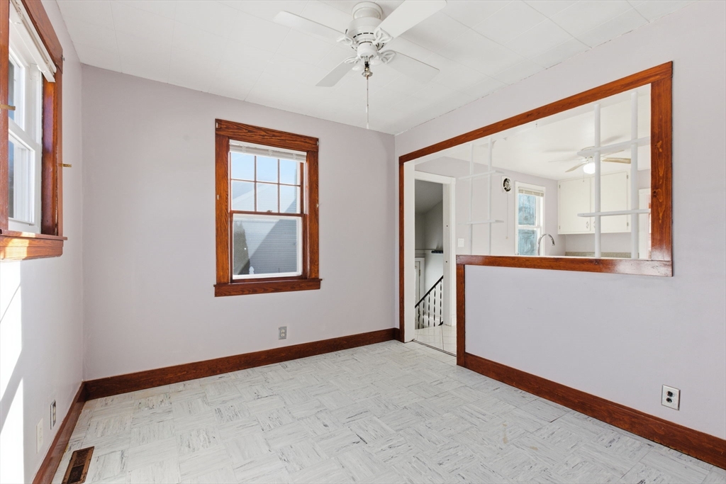 8 Plain Street Randolph, MA 02368 - Photo 20 of 38 a view of an empty room with a window