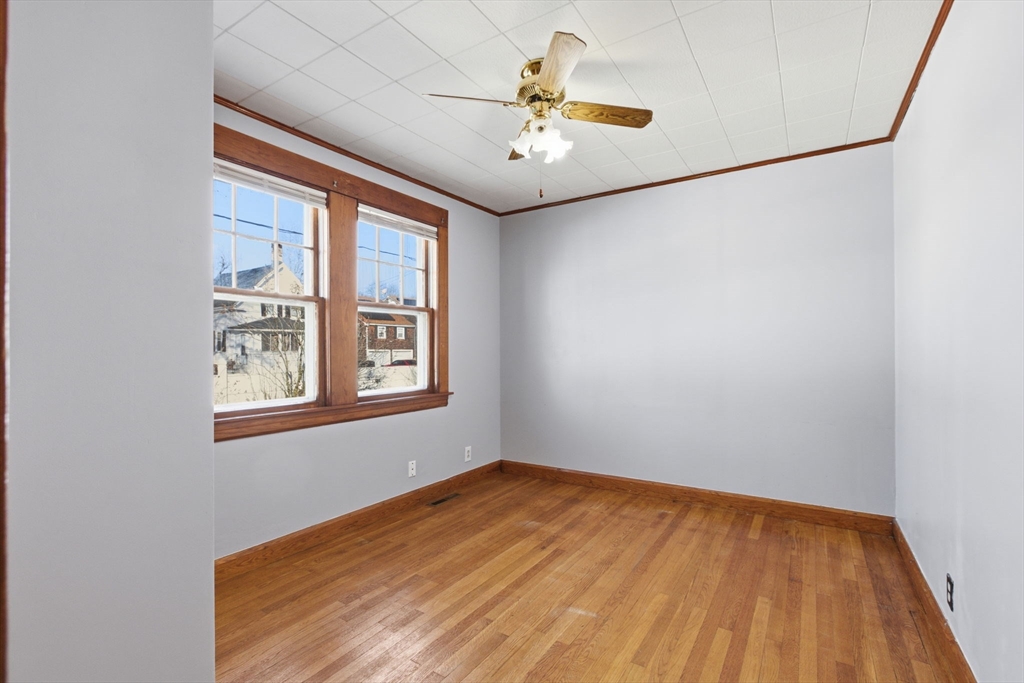 8 Plain Street Randolph, MA 02368 - Photo 22 of 38 a view of an empty room with a window