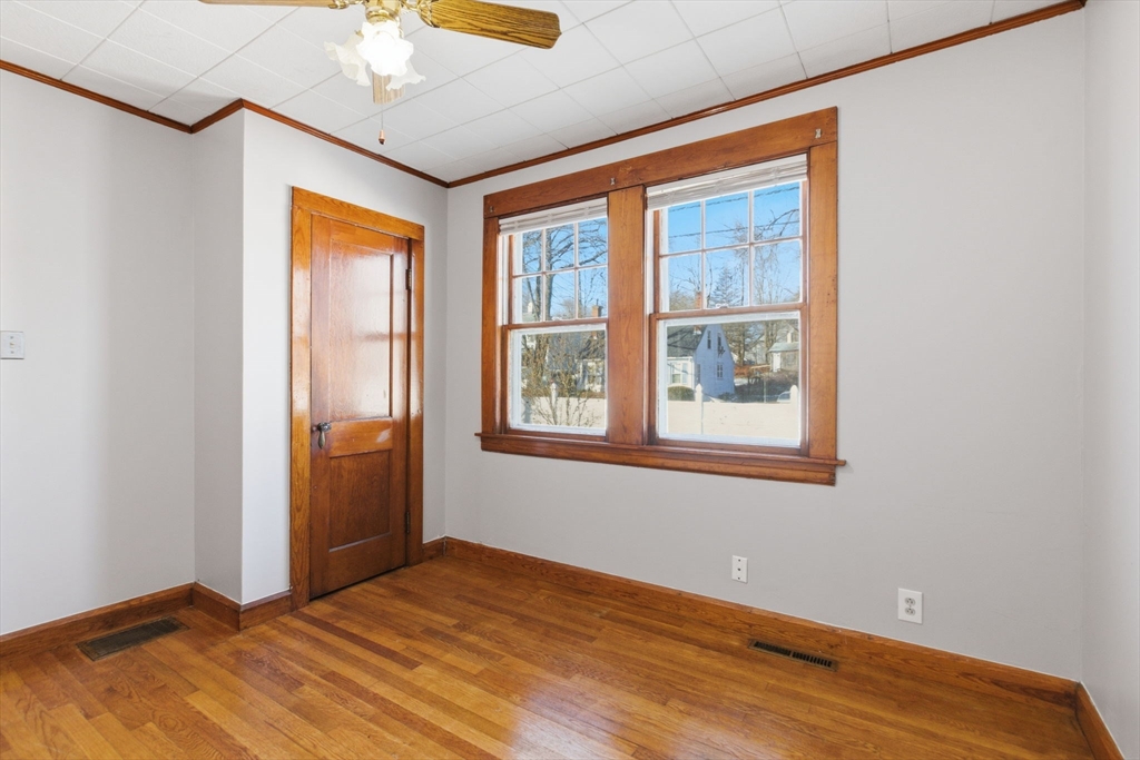 8 Plain Street Randolph, MA 02368 - Photo 23 of 38 a view of an empty room with a window