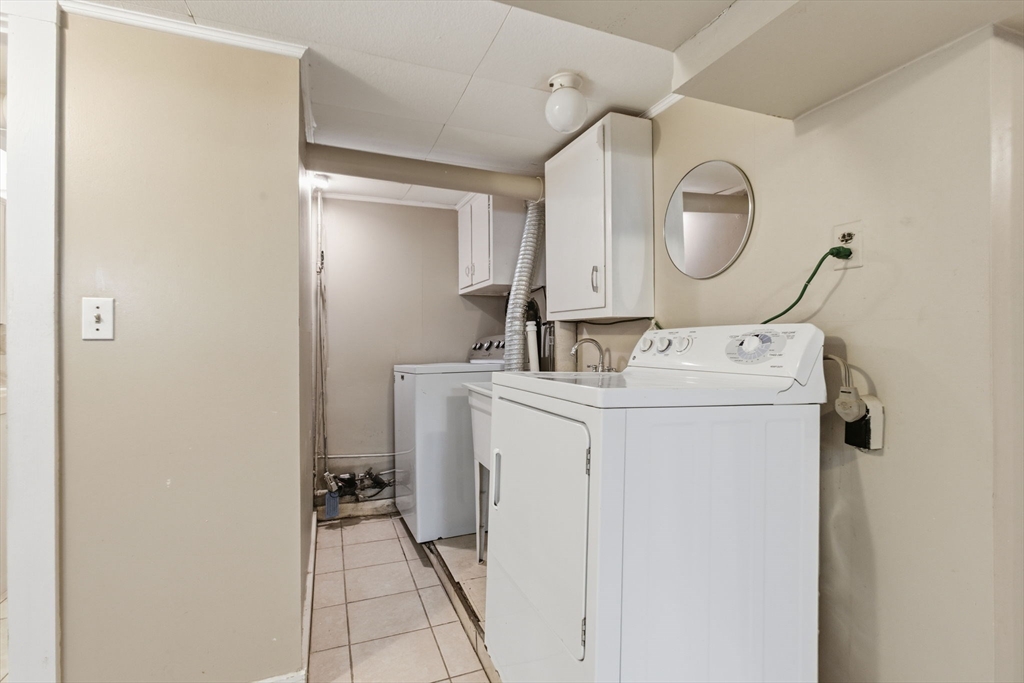 8 Plain Street Randolph, MA 02368 - Photo 28 of 38 a utility room with dryer and washer