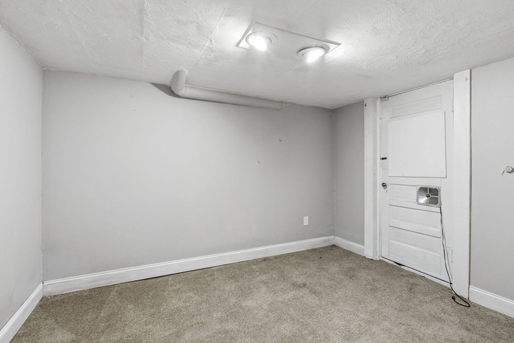 8 Plain Street Randolph, MA 02368 - Photo 29 of 38 wooden floor in an empty room