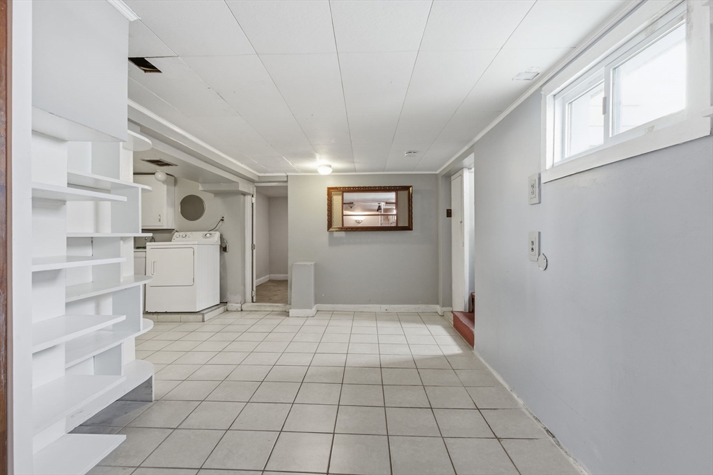 8 Plain Street Randolph, MA 02368 - Photo 31 of 38 a view of a livingroom with an empty space