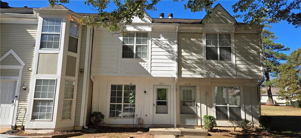 a front view of a building with street