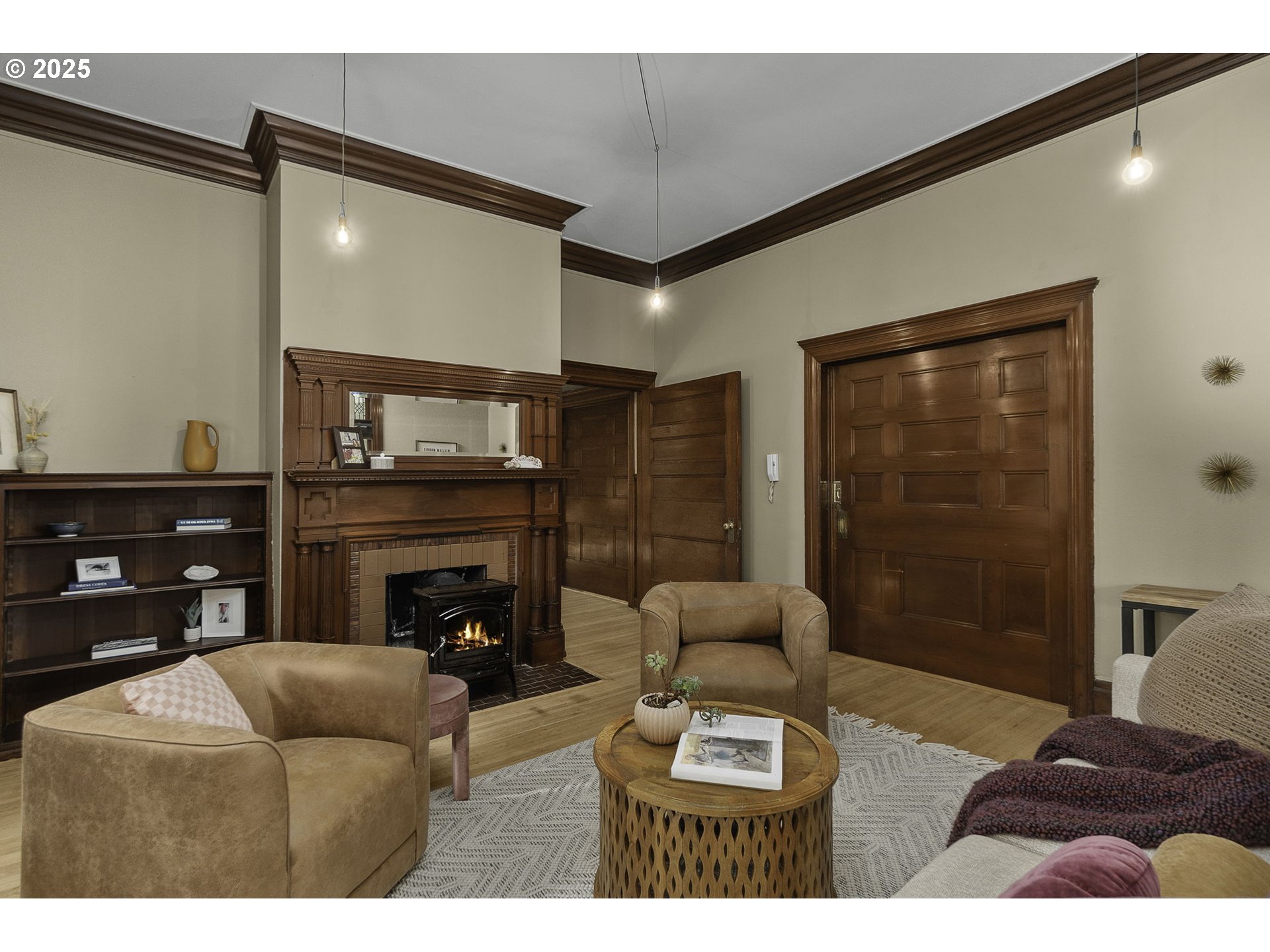333 Northwest 20th Avenue, Unit 2 Portland, OR 97209 - Photo 13 of 28 a living room with furniture and a fireplace
