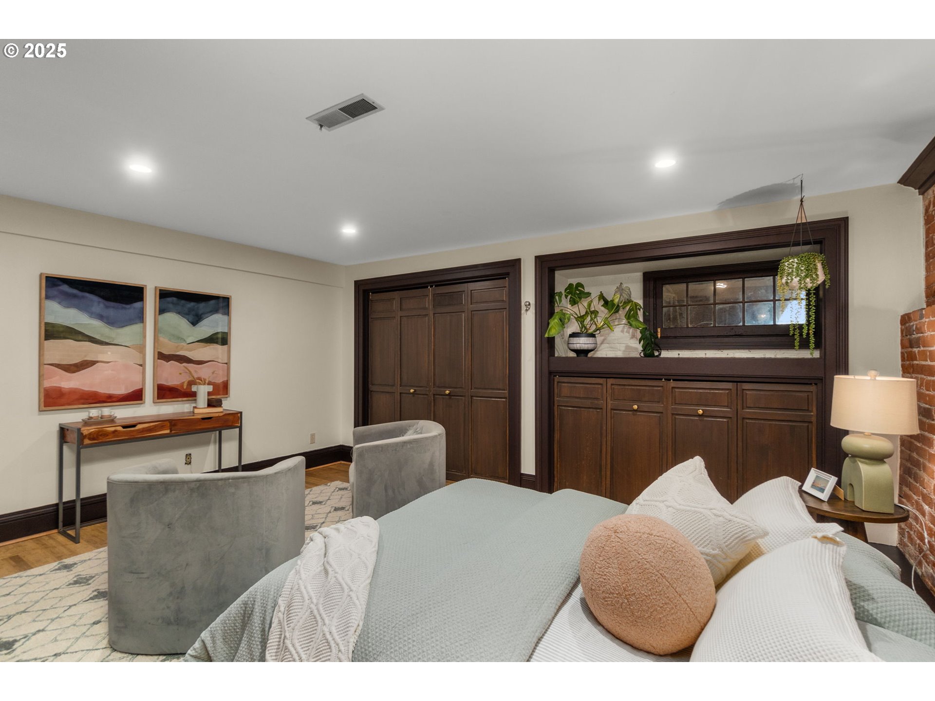 333 Northwest 20th Avenue, Unit 2 Portland, OR 97209 - Photo 18 of 28 a bedroom with a bed and furniture