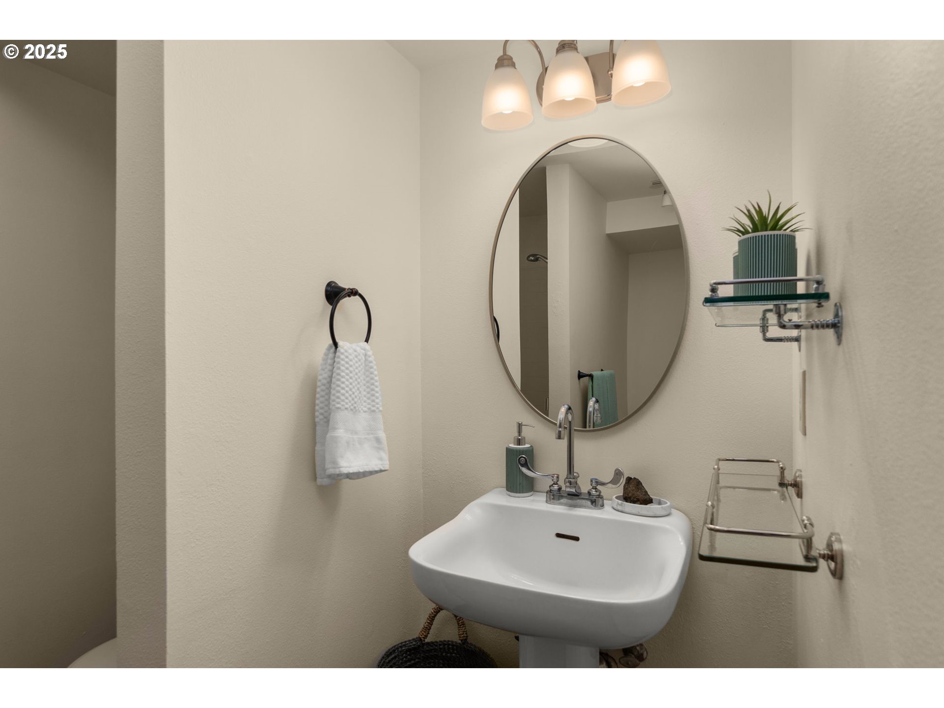 333 Northwest 20th Avenue, Unit 2 Portland, OR 97209 - Photo 19 of 28 a bathroom with a sink and a mirror