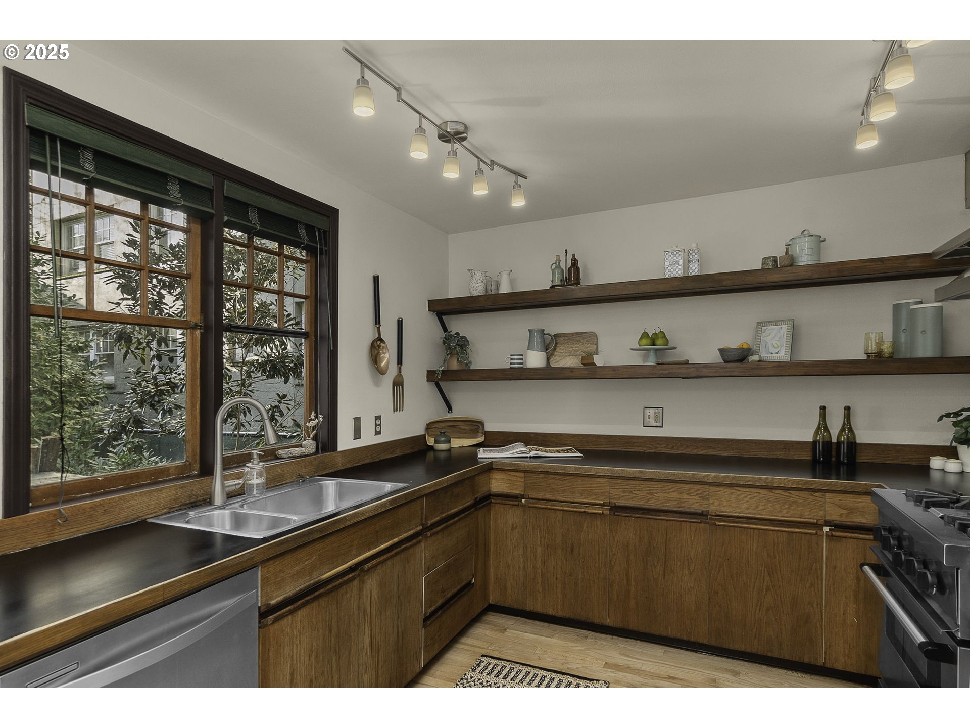 333 Northwest 20th Avenue, Unit 2 Portland, OR 97209 - Photo 8 of 28 a kitchen with a sink and cabinets
