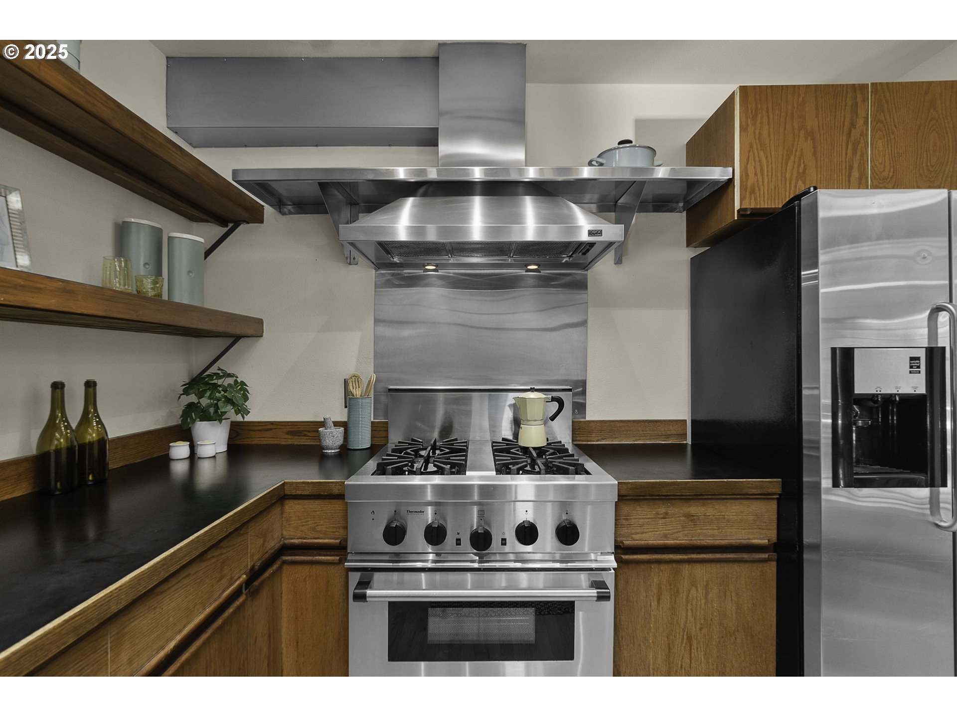 333 Northwest 20th Avenue, Unit 2 Portland, OR 97209 - Photo 9 of 28 a kitchen with a stove and a sink
