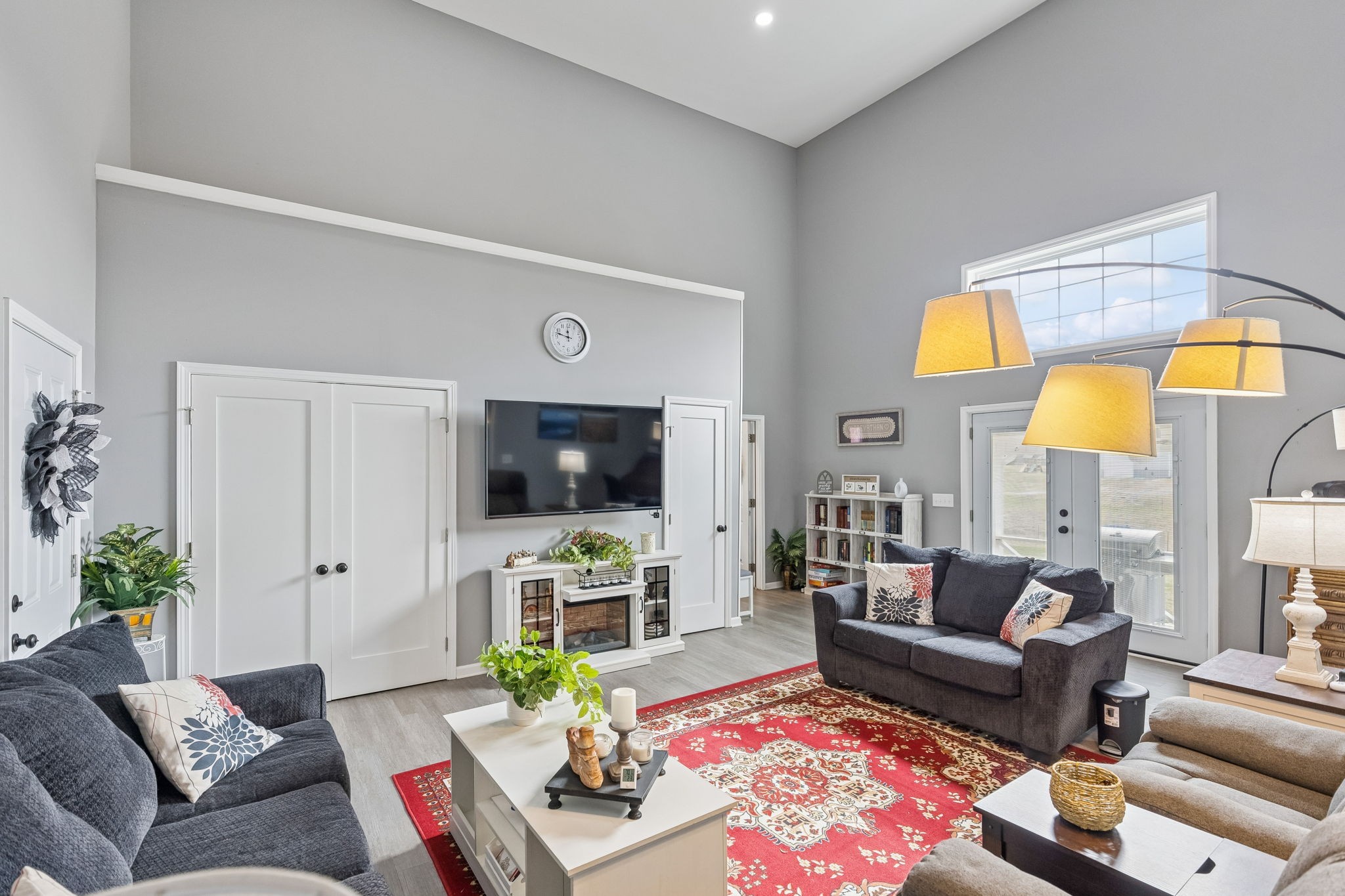 403 Bland Road Estill Springs, TN 37330 - Photo 20 of 53 a living room with furniture a flat screen tv and a large window