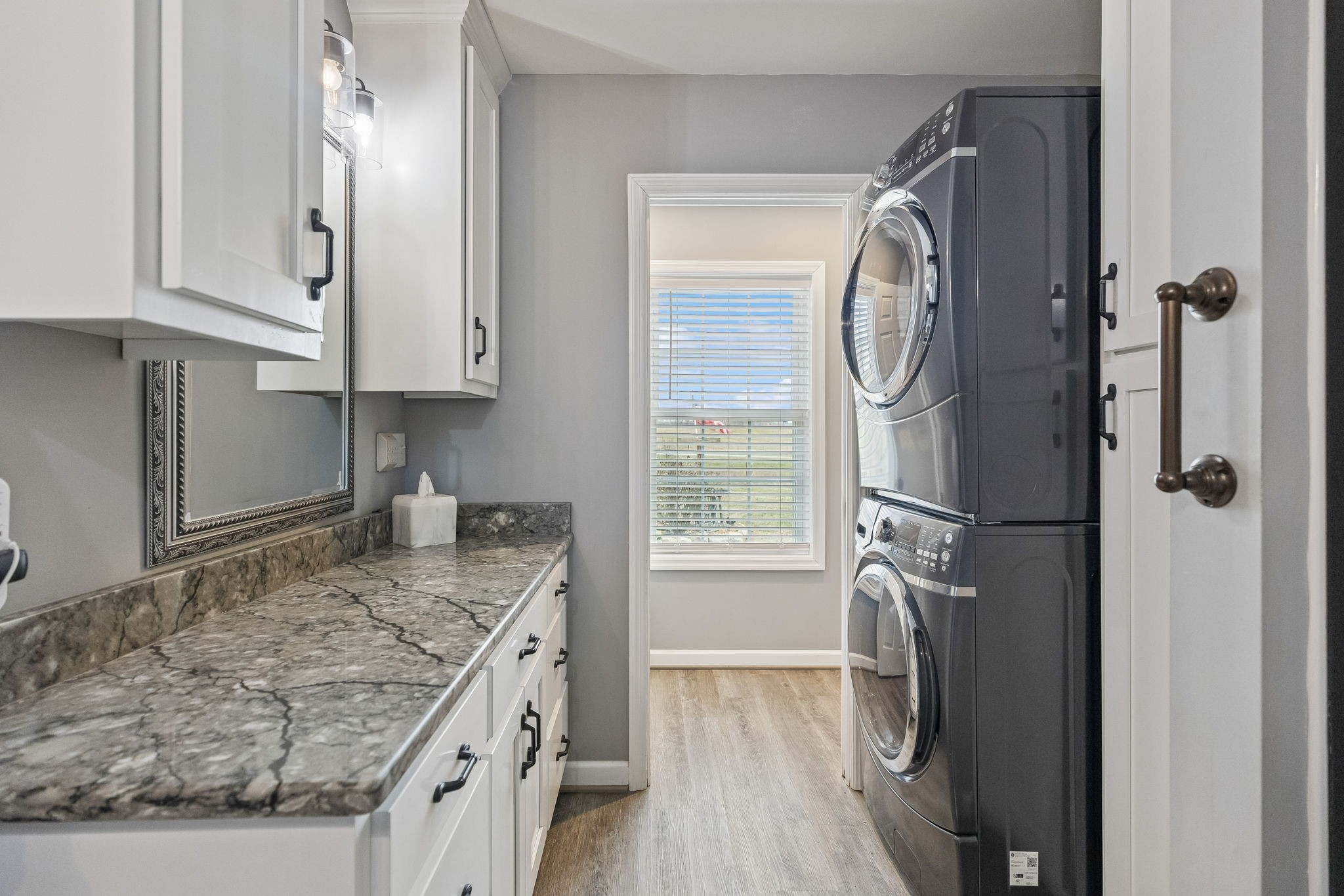 403 Bland Road Estill Springs, TN 37330 - Photo 22 of 53 a kitchen with granite countertop a sink stove and refrigerator