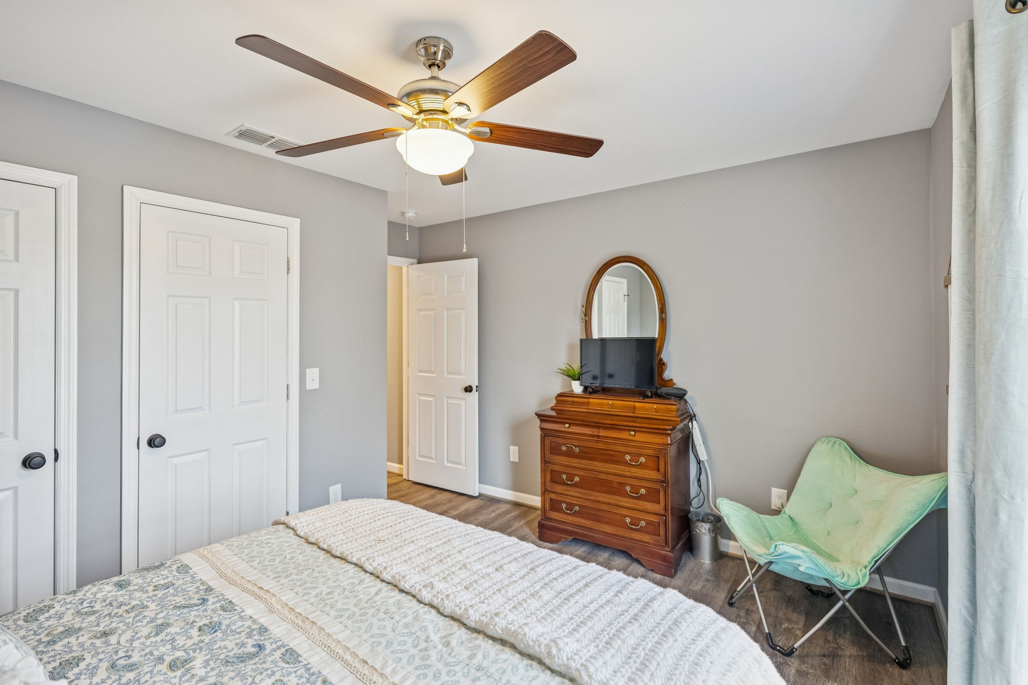 403 Bland Road Estill Springs, TN 37330 - Photo 28 of 53 a bedroom with a bed and a dresser