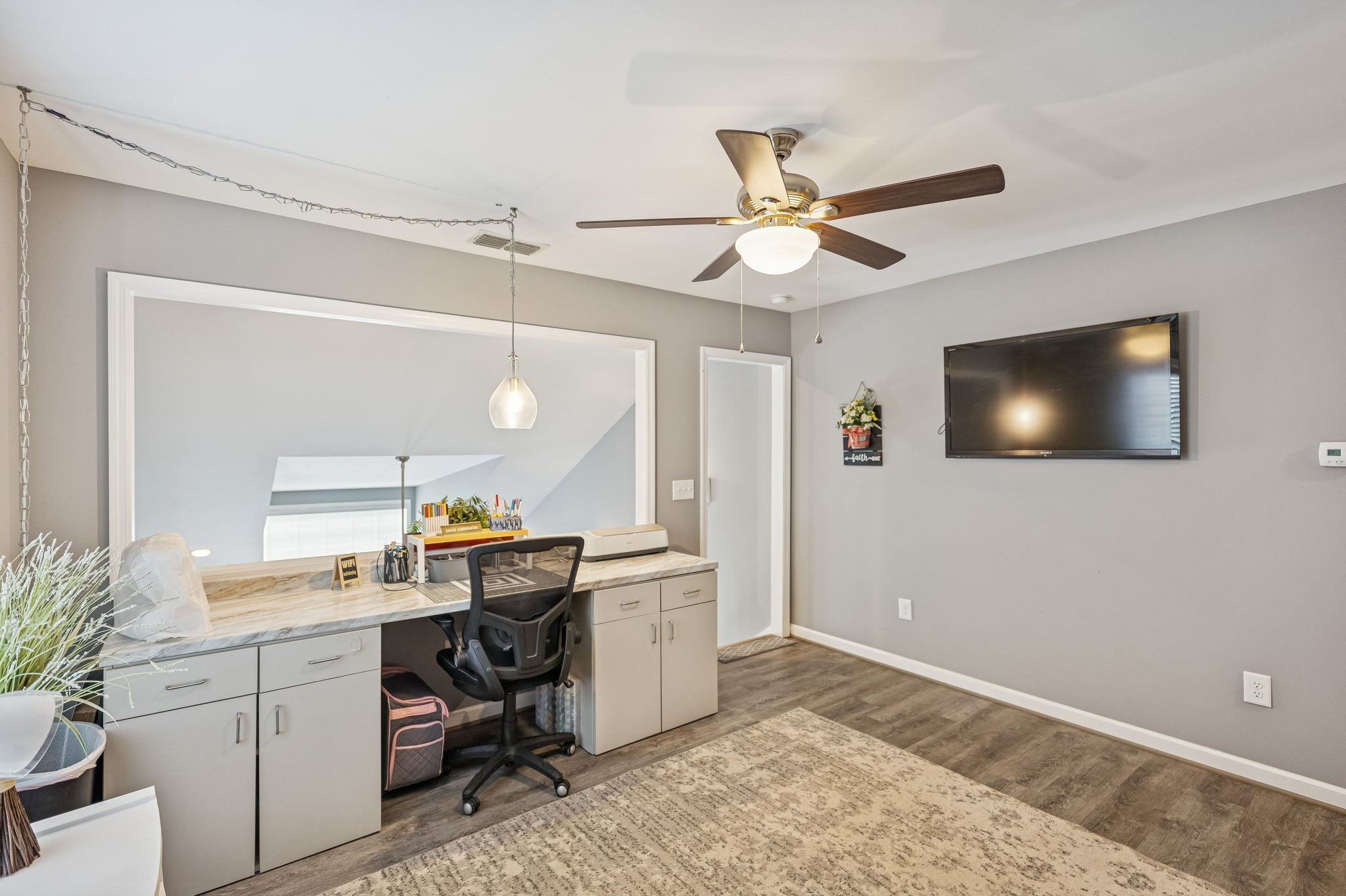 403 Bland Road Estill Springs, TN 37330 - Photo 29 of 53 a view of a workspace with furniture and a window