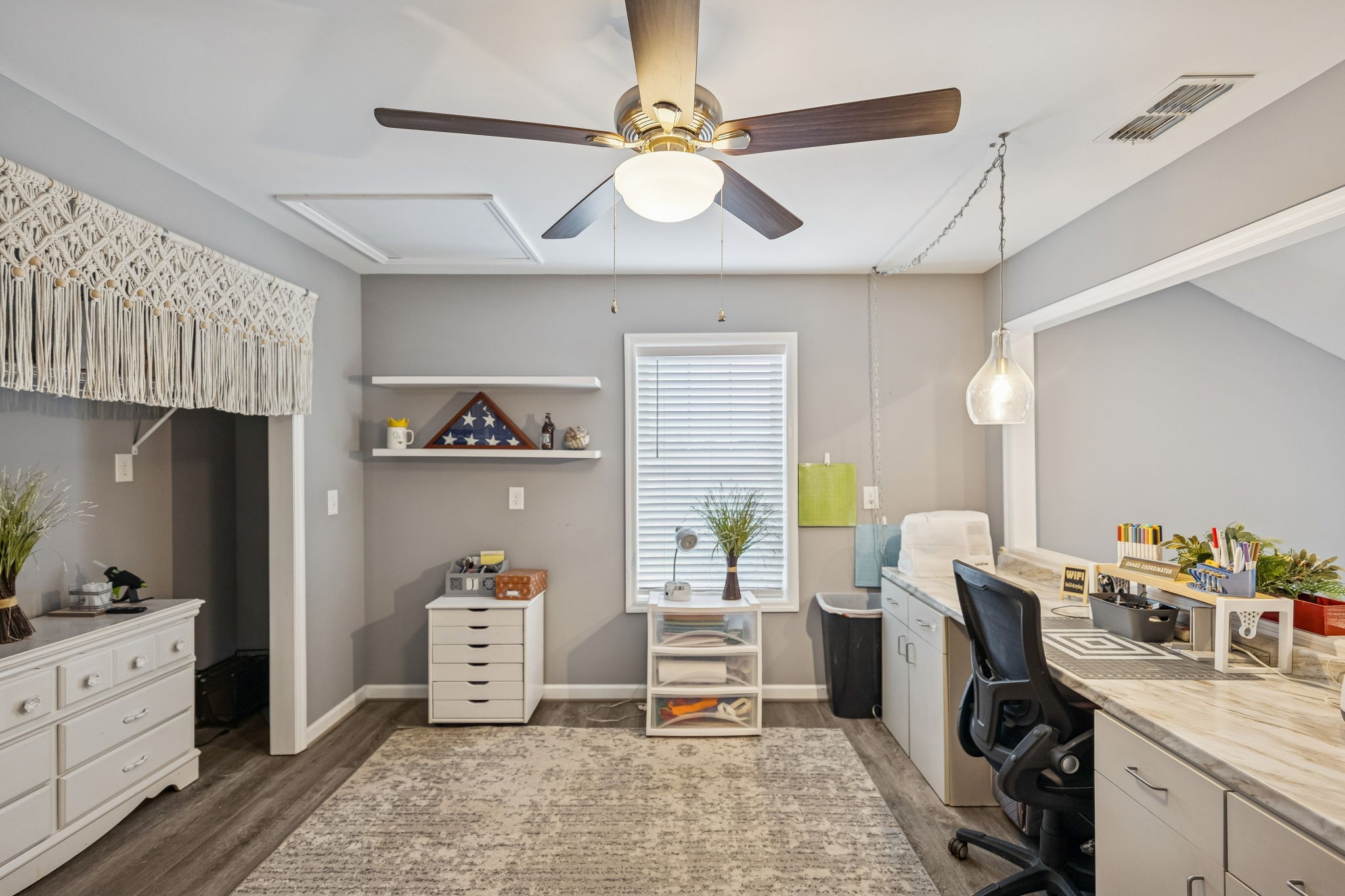 403 Bland Road Estill Springs, TN 37330 - Photo 30 of 53 a living room with furniture and a chandelier