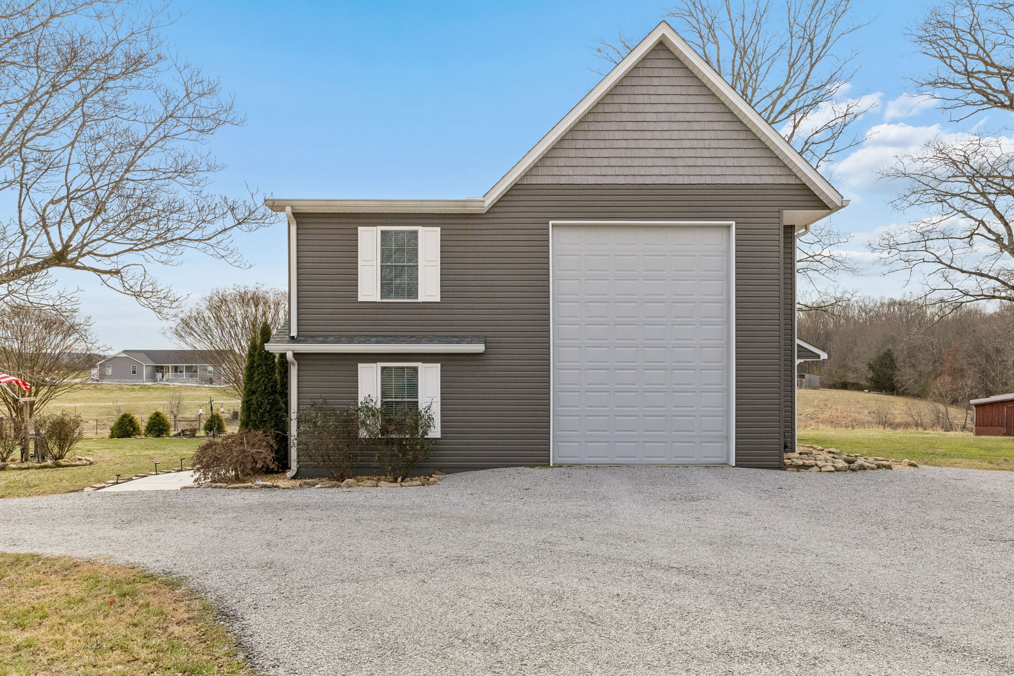 403 Bland Road Estill Springs, TN 37330 - Photo 35 of 53 a view of a house with a yard