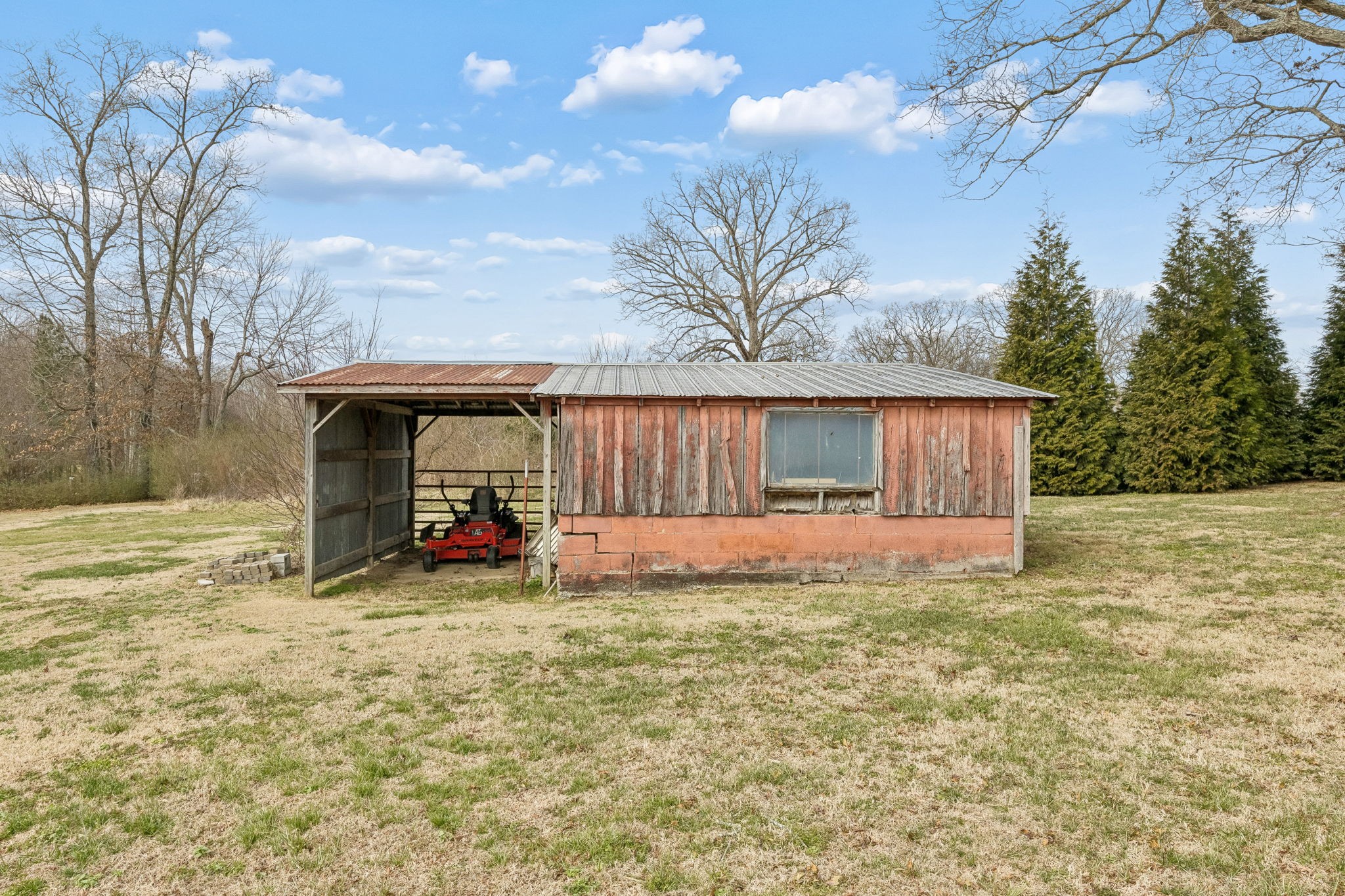 403 Bland Road Estill Springs, TN 37330 - Photo 44 of 53 a view of a house with a yard and garage